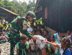 Satgas Yonif 136/TS Laksanakan Ibadah Minggu Bersama Masyarakat