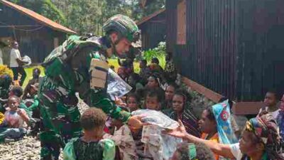 Satgas Yonif 136/TS Laksanakan Ibadah Minggu Bersama Masyarakat