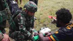 Satgas Yonif 136/Tuah Sakti Gelar Karya Bakti di Distrik Wanenggobak, Menyemai Harapan Bersama Masyarakat