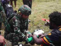 Satgas Yonif 136/Tuah Sakti Gelar Karya Bakti di Distrik Wanenggobak, Menyemai Harapan Bersama Masyarakat