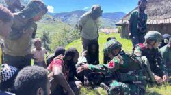 Satgas Pamtas Mobile RI–PNG Yonif 136/Tuah Sakti Pos Ilu, Laksanakan Anjangsana  Dirangkaikan Dengan Pelayanan Kesehatan Gratis Bagi Masyarakat Kampung Dolinggame Papua