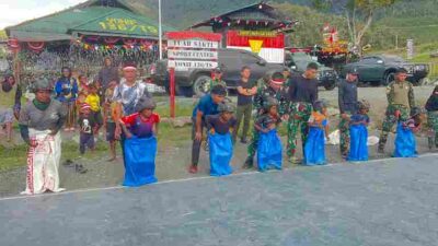 Semarak Perlombaan HUT RI Ke 81, Satgas Yonif 136/Tuah Sakti Rayakan dengan Perlombaan Bersama Anak-Anak Papua di Puncak Jaya Papua Tengah
